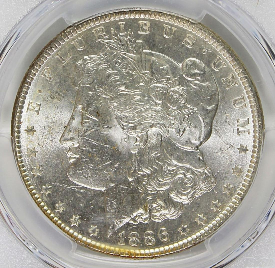 1886 MORGAN SILVER DOLLAR (1 of 4)