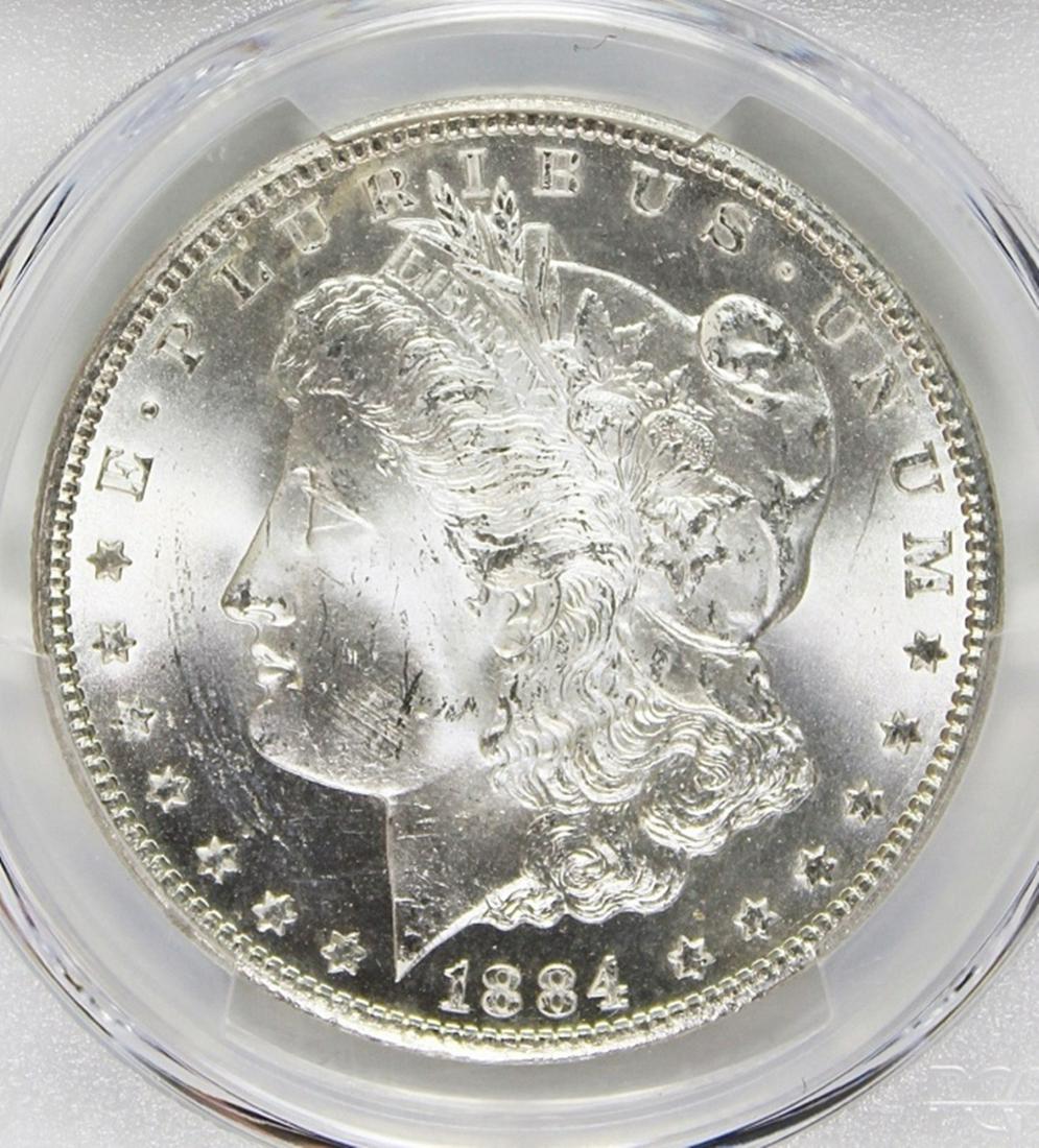 1884-CC MORGAN SILVER DOLLAR: PCGS MS 64 BLAST WHITE! ESTIMATE: $325-$425