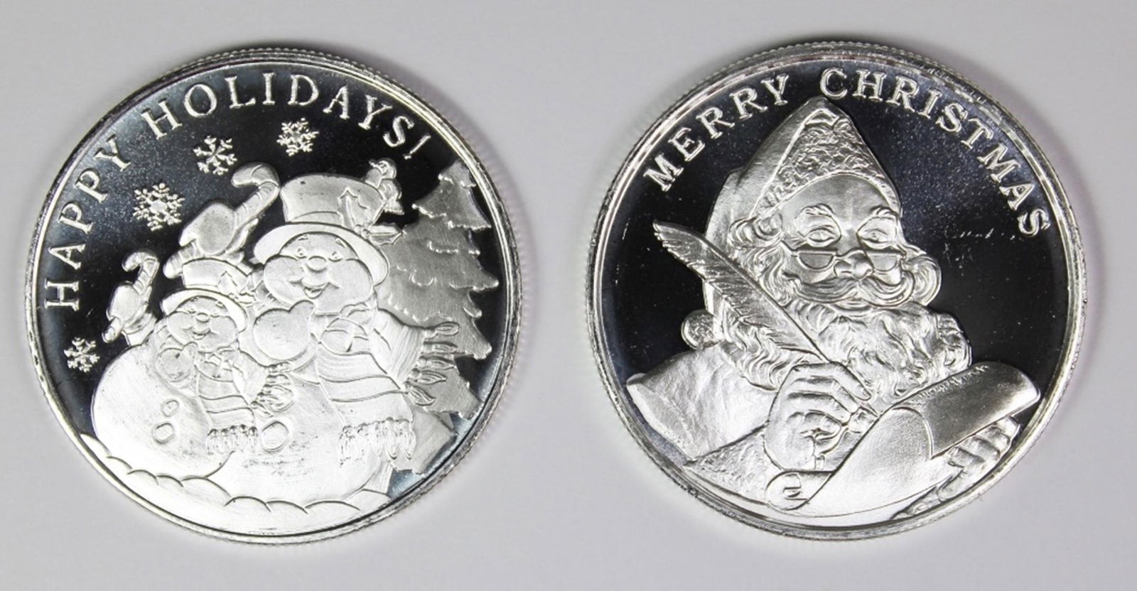 (2) DIFFERENT 2019 CHRISTMAS SILVER ROUNDS (1 of 2)