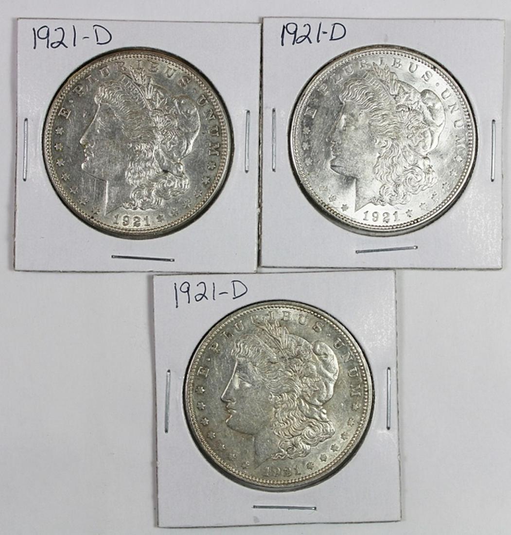 (3) 1921-D MORGAN SILVER DOLLARS: AU/UNC. ESTIMATE: $110-$150