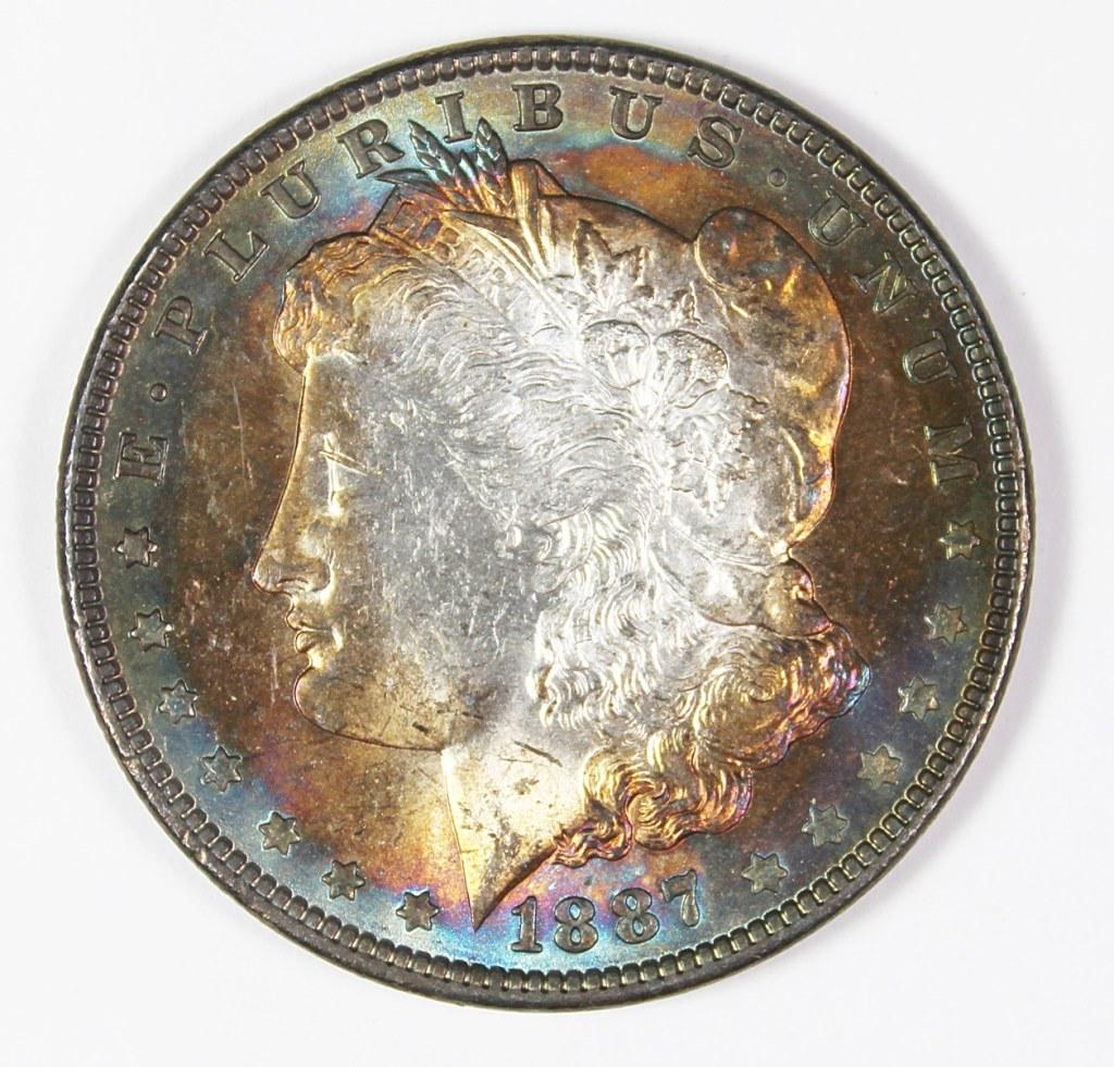 1887 MORGAN SILVER DOLLAR (1 of 2)