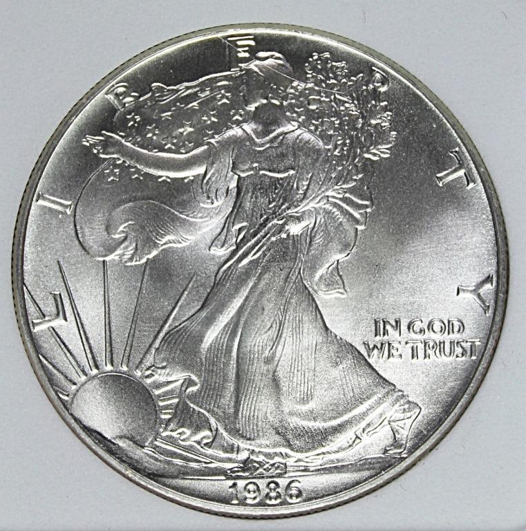 1986 AMERICAN SILVER EAGLE: PNA MS 70. ESTIMATE: $175-$250