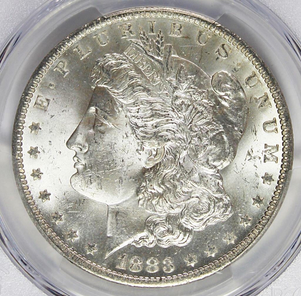 1883-O MORGAN SILVER DOLLAR: PCGS MS 64 BLAST WHITE! ESTIMATE: $95-$150
