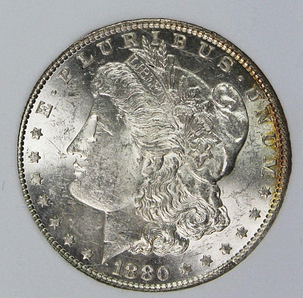 1880-O MORGAN SILVER DOLLAR: PNA MS 64 BLAST WHITE WITH A LITTLE RAINBOW COLOR FROM THE ORIGINAL CANVAS BAG IT WAS IN. ESTIMATE: $325-$425