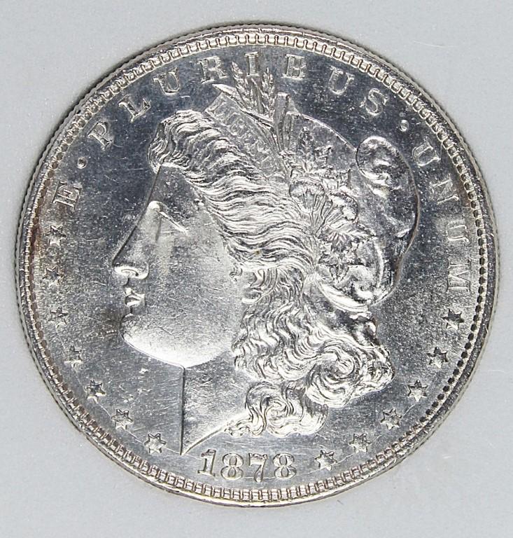 1878 8F MORGAN SILVER DOLLAR: RNG MS 66. BLAST WHITE. ESTIMATE: $550-$650