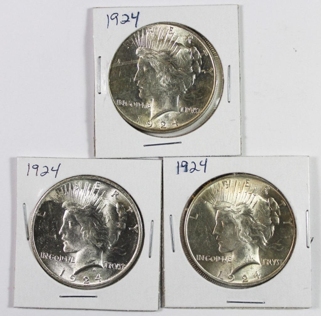 (3) 1924 PEACE SILVER DOLLARS (1 of 2)