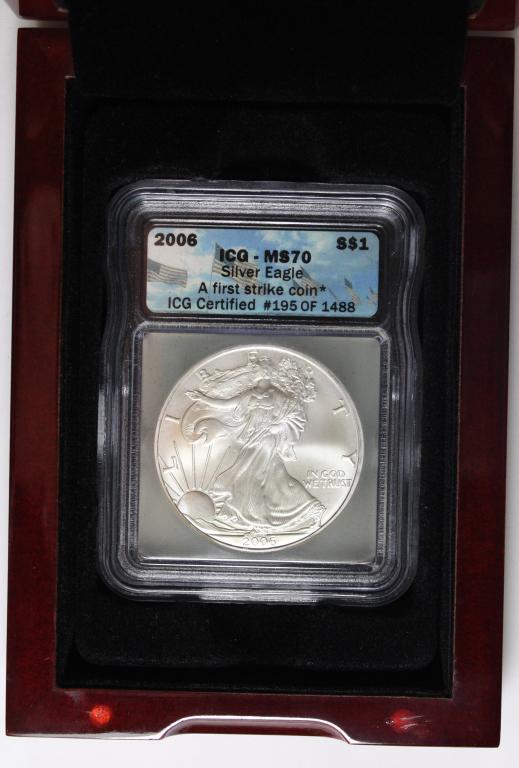 2006 AMERICAN SILVER EAGLE: ICG MS 70. IN WOOD BOX. ESTIMATE: $125-$150