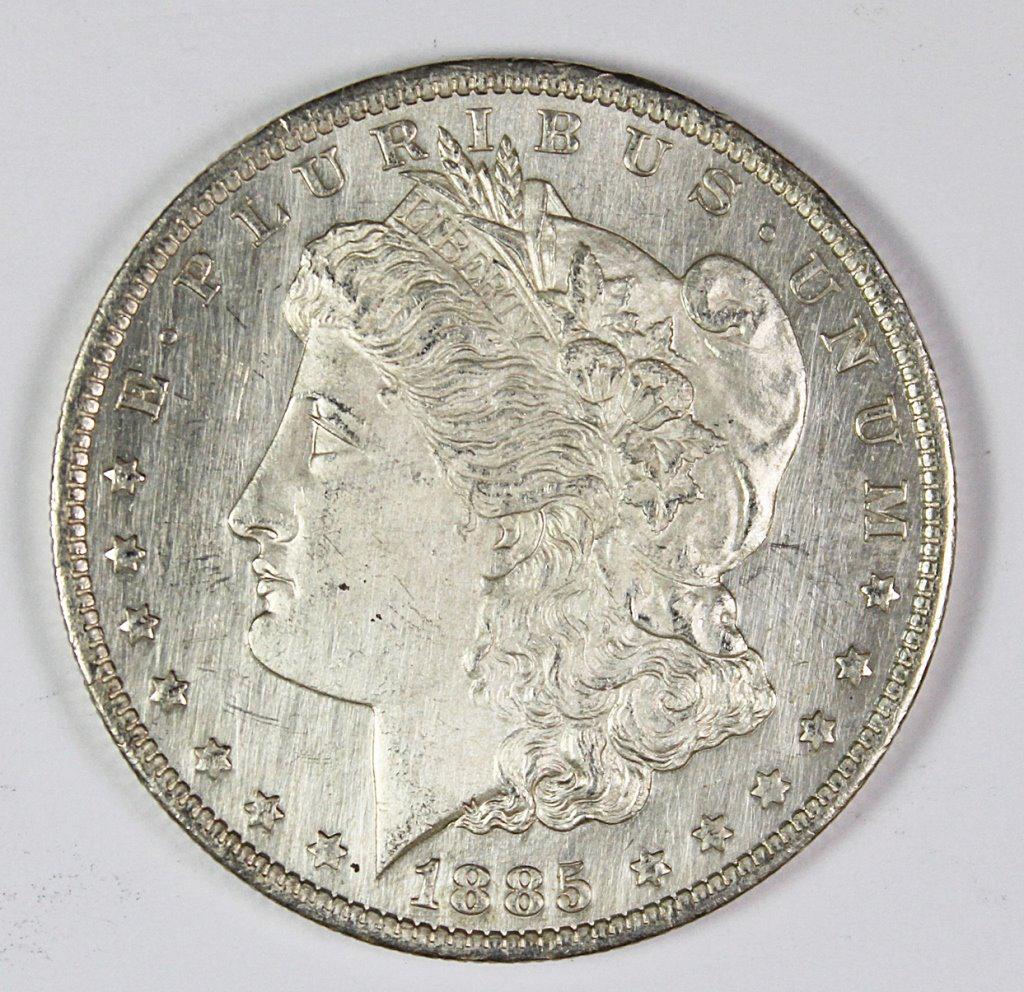 1885-O MORGAN SILVER DOLLAR (1 of 2)