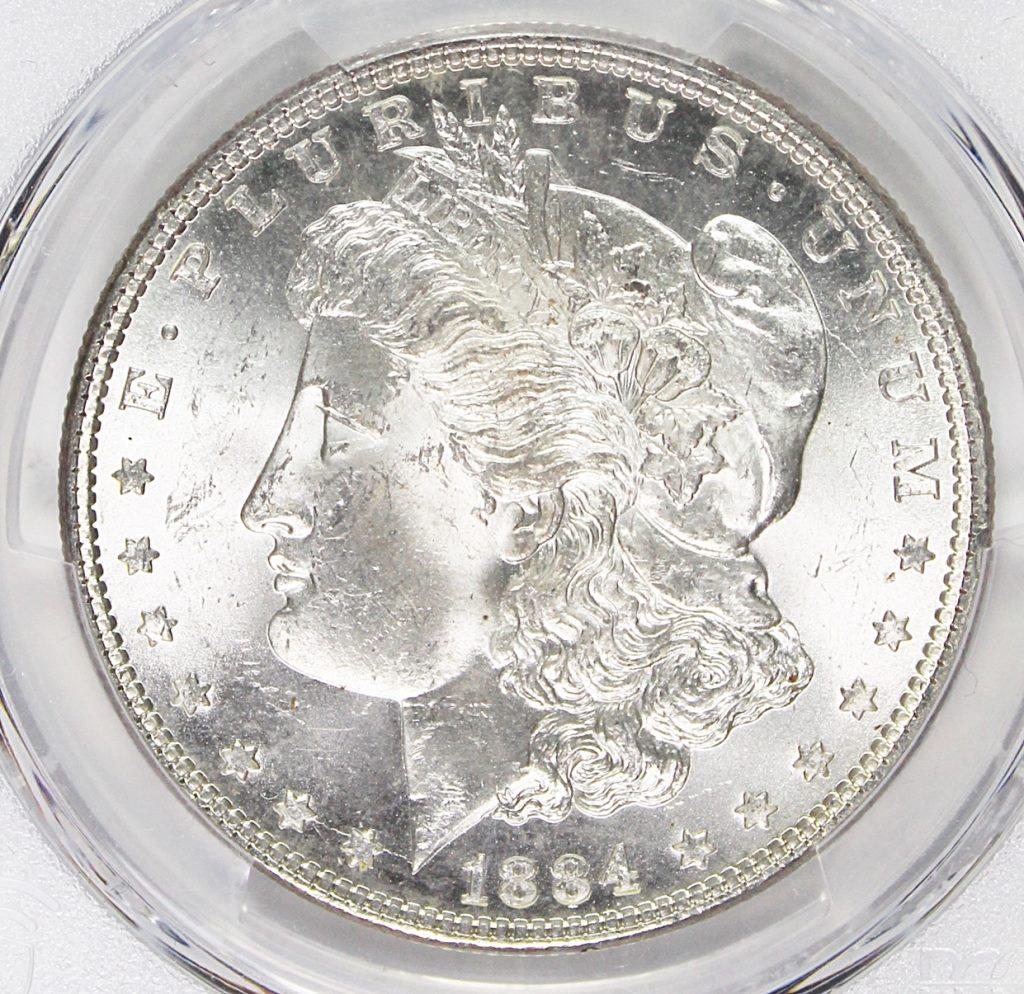 1884 MORGAN SILVER DOLLAR: PCGS MS 63 BLAST WHITE! ESTIMATE: $110-$150
