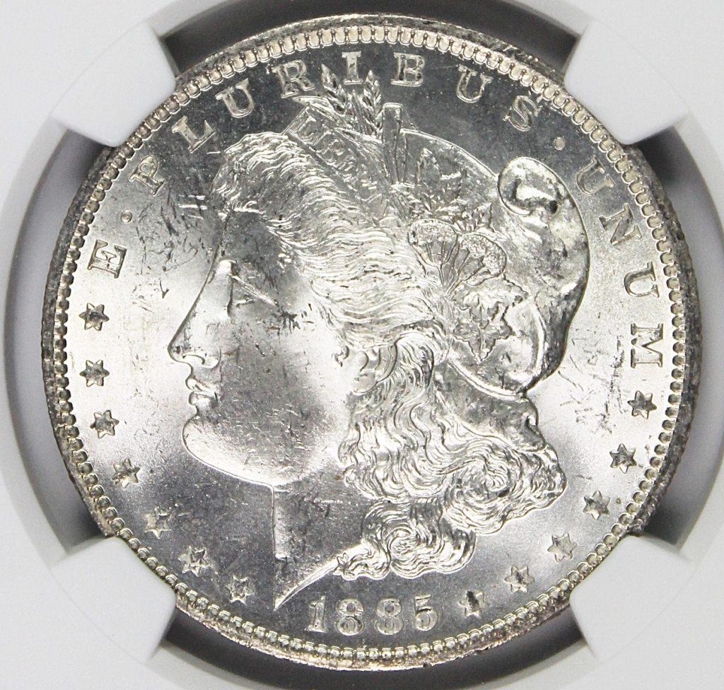 1885-O MORGAN SILVER DOLLAR: NGC MS 64 BLAST WHITE! SUPERB! ESTIMATE: $115-$150