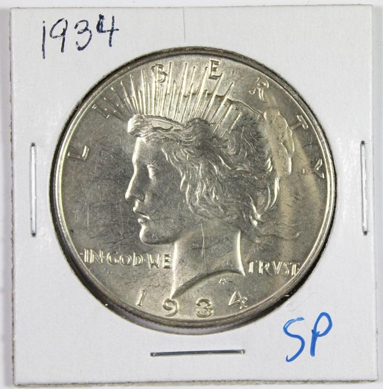 1934 PEACE SILVER DOLLAR (1 of 2)