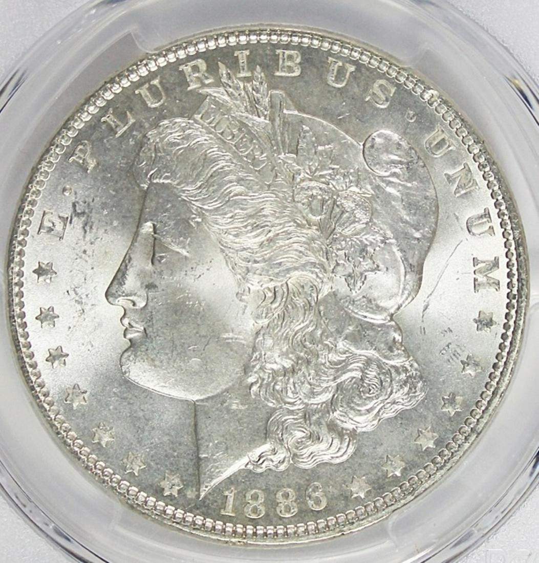 1886 MORGAN SILVER DOLLAR (1 of 4)