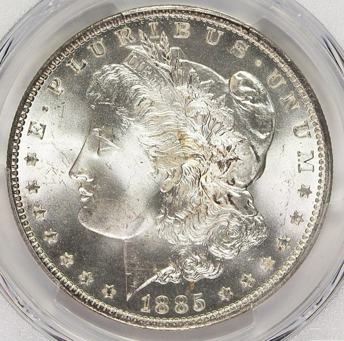 1885-O MORGAN SILVER DOLLAR: PCGS MS 65 BLAST WHITE! ESTIMATE: $225-$300