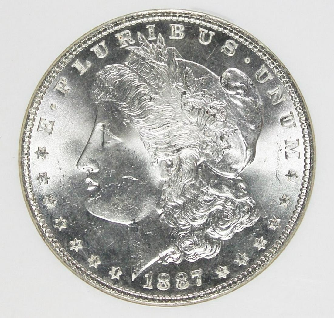 1887 MORGAN SILVER DOLLAR (1 of 4)