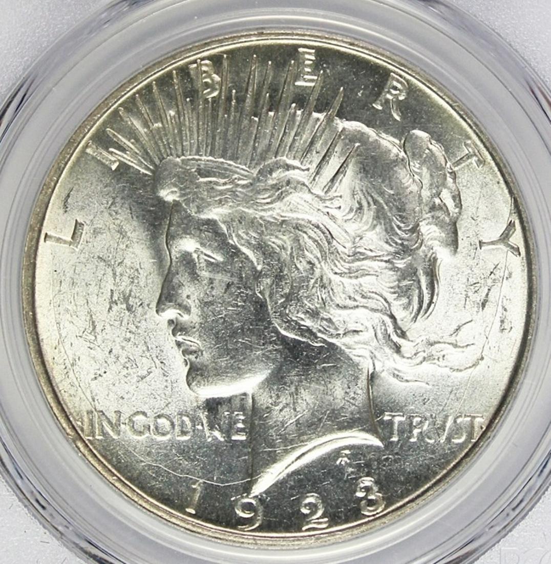 1923-D PEACE SILVER DOLLAR: PCGS MS 62 BLAST WHITE! ESTIMATE: $160-$200