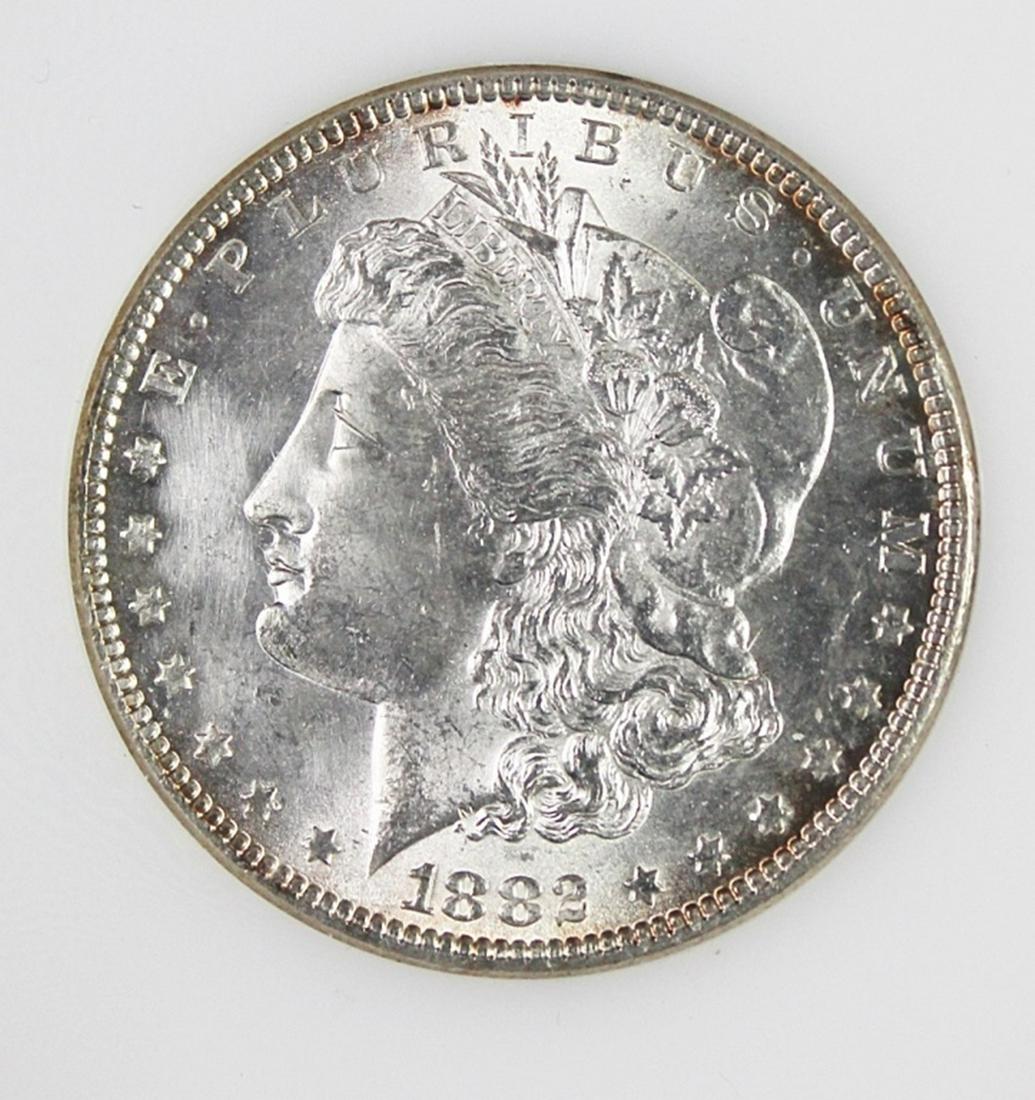 1882 MORGAN SILVER DOLLAR (1 of 2)