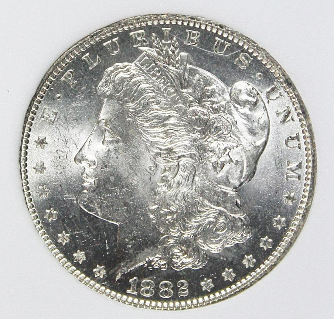 1882-O MORGAN SILVER DOLLAR: RNG MS 65+. BLAST WHITE! ESTIMATE: $475-$550