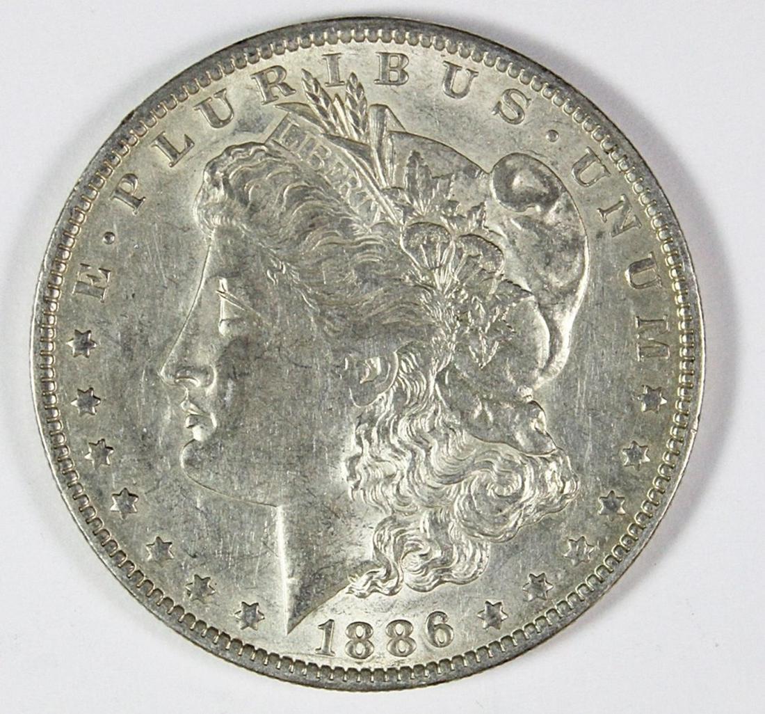 1886-O MORGAN SILVER DOLLAR (1 of 2)