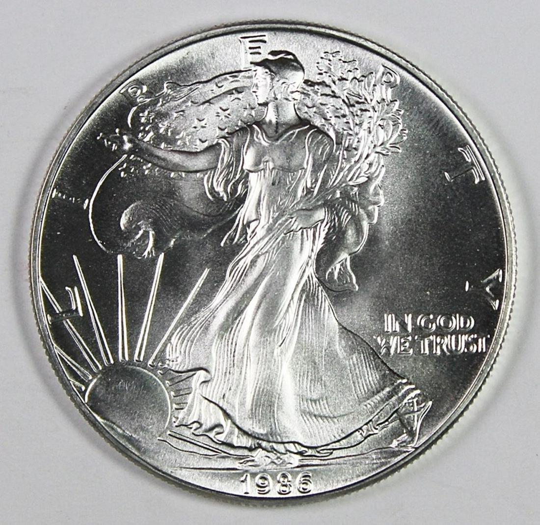 1986 AMERICAN SILVER EAGLE: SUPERB BU+++. ESTIMATE: $250-$300