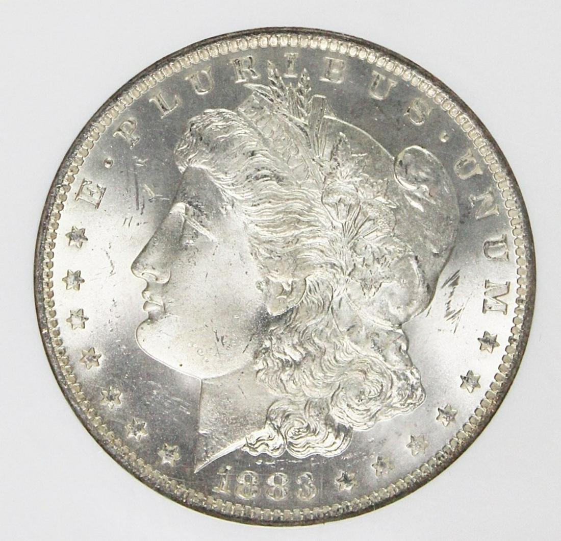 1883-O MORGAN SILVER DOLLAR: NGC MS 65 BLAST WHITE! ESTIMATE: $250-$300