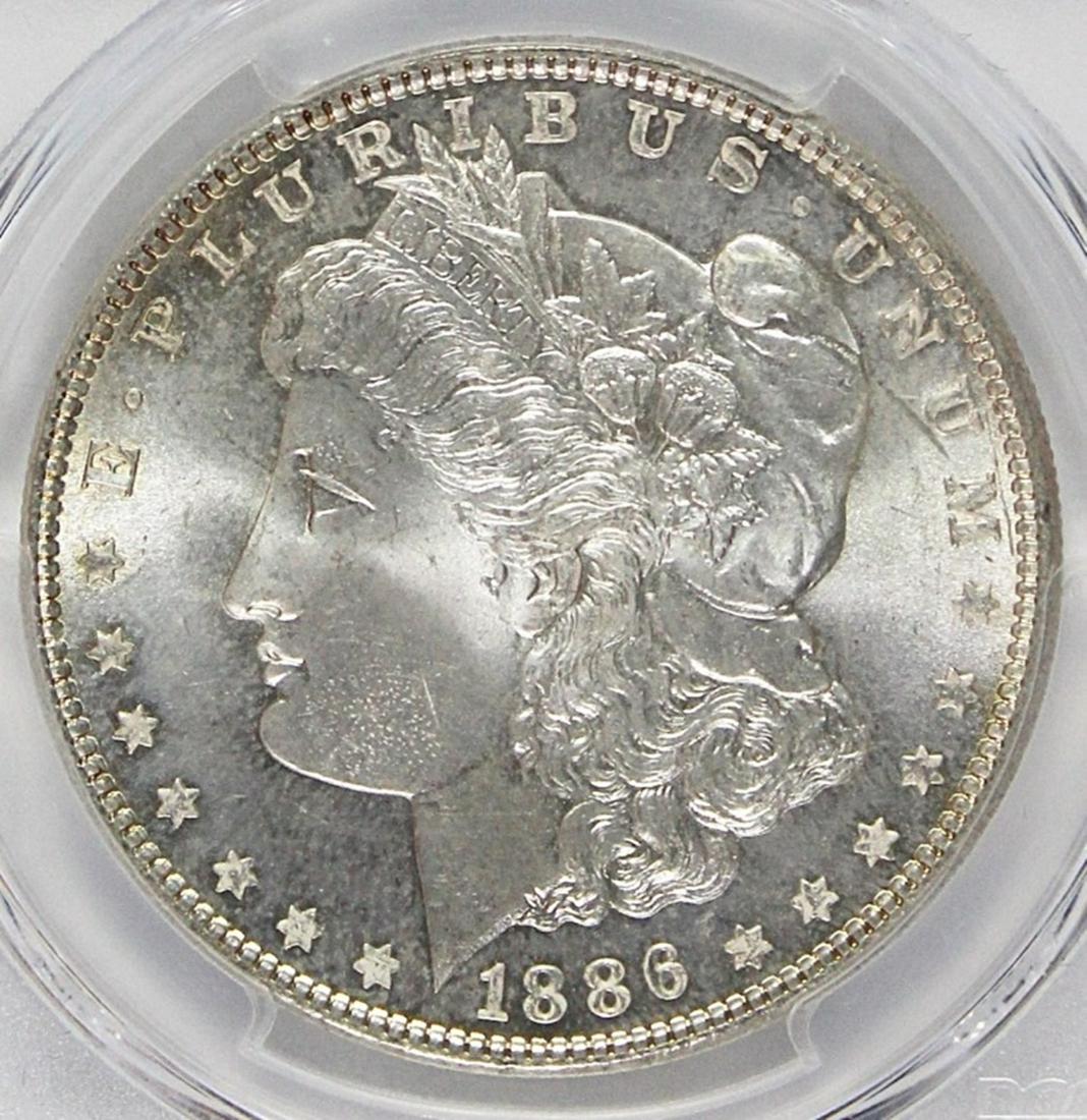 1886 MORGAN SILVER DOLLAR (1 of 4)
