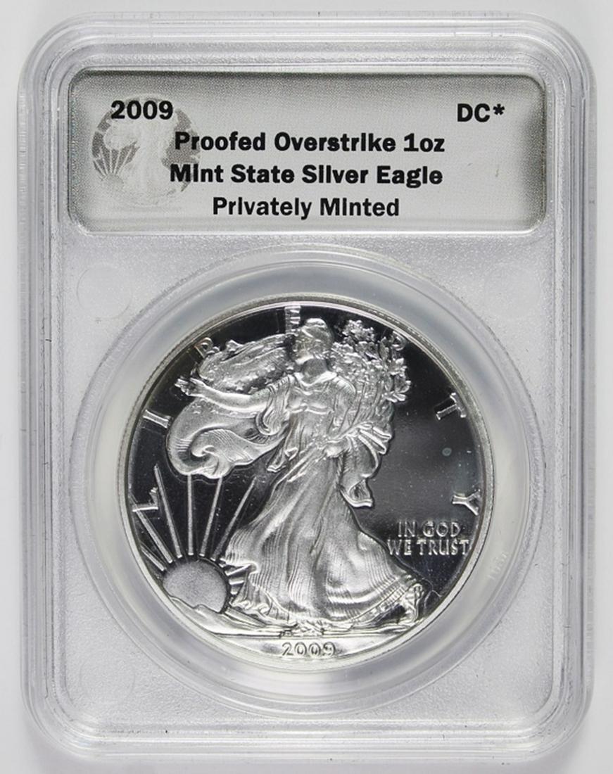 2009 AMERICAN SILVER EAGLE: PROOFED OVERSTRIKE BY DANIEL CARR. ESTIMATE: $150-$200