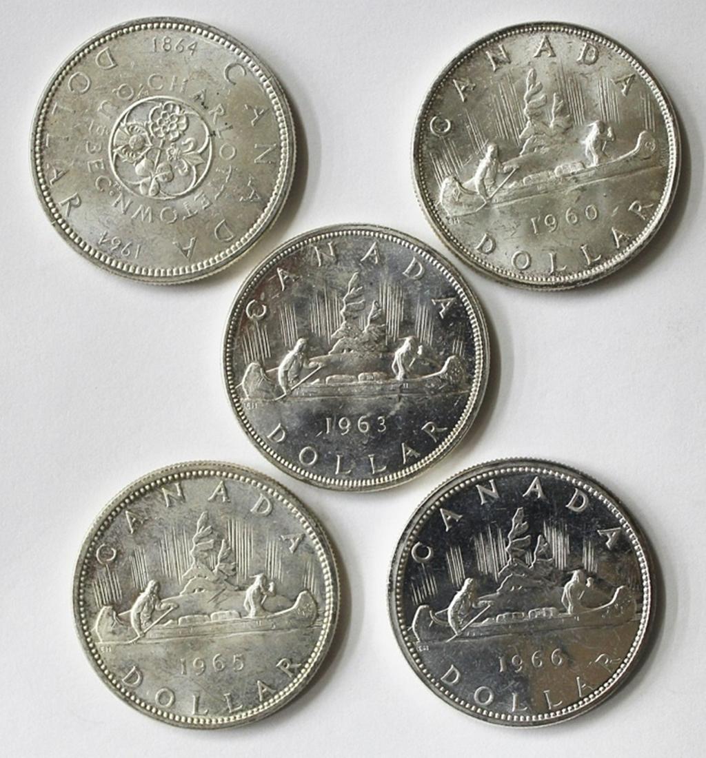 GEM BU CANADA SILVER DOLLARS (1 of 2)