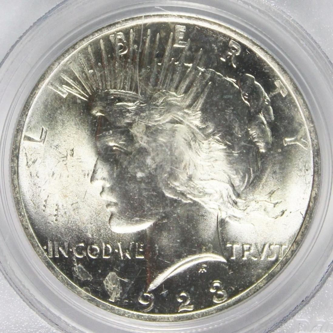 1923 PEACE SILVER DOLLAR: PCGS MS 64 BLAST WHITE! ESTIMATE: $95-$125