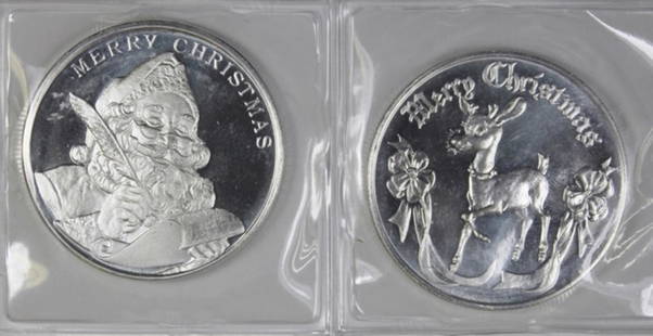 (2) 1 OZ SILVER CHRISTMAS ROUNDS: .999 PURE SILVER. 1 OZ EACH. 2 OZ TOTAL. ESTIMATE: $90-$125