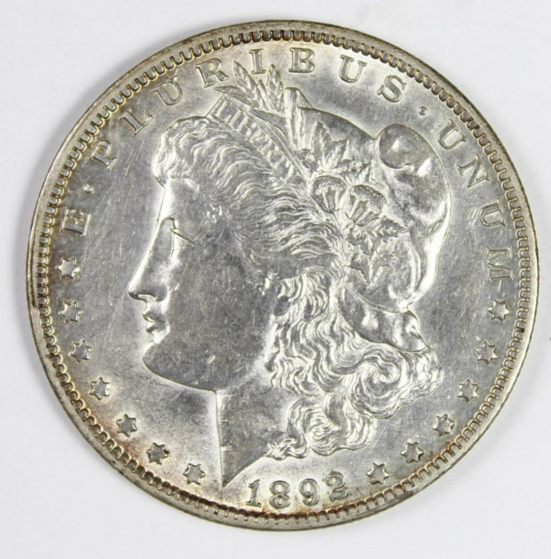 1892-O MORGAN SILVER DOLLAR (1 of 2)