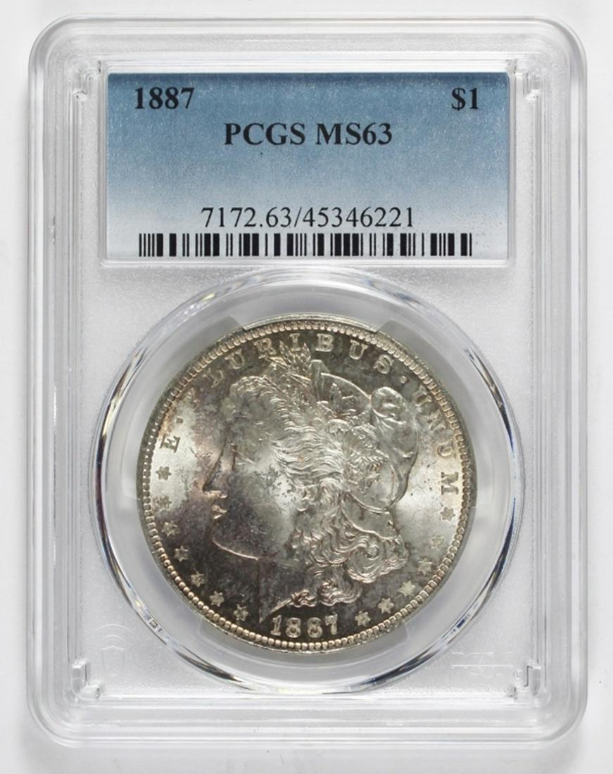 1887 MORGAN SILVER DOLLAR: PCGS MS 63 COLORS. ESTIMATE: $85-$125