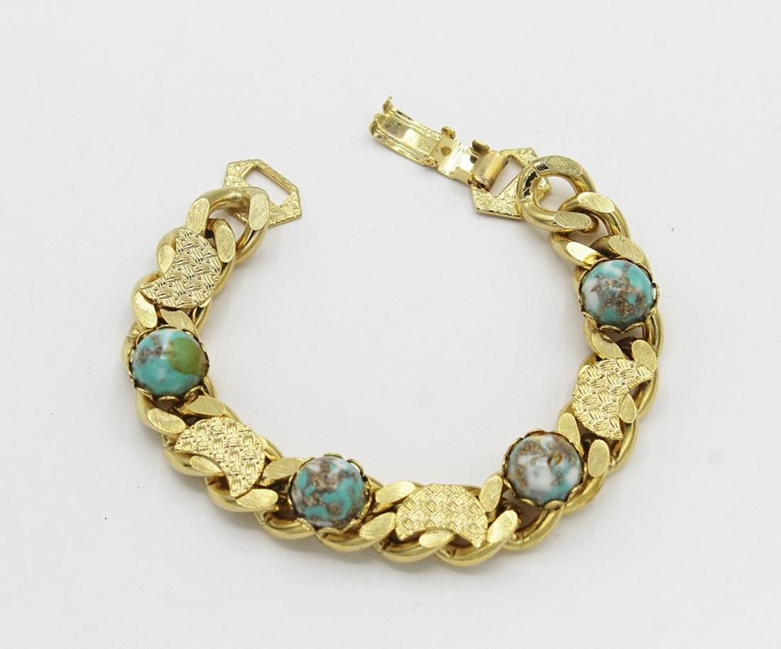 FAUX TURQUOISE BRACELET: GOLD PLATED. 7" LONG. ESTIMATE: $30-$50
