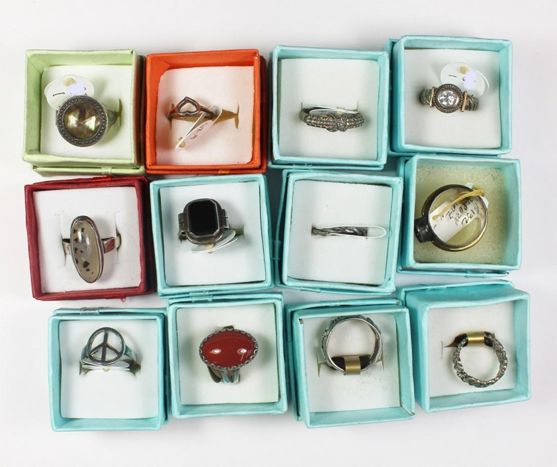 STERLING SILVER RING LOT: 12 RINGS, SIZES 5.5 TO 10. ESTIMATE $400-$500