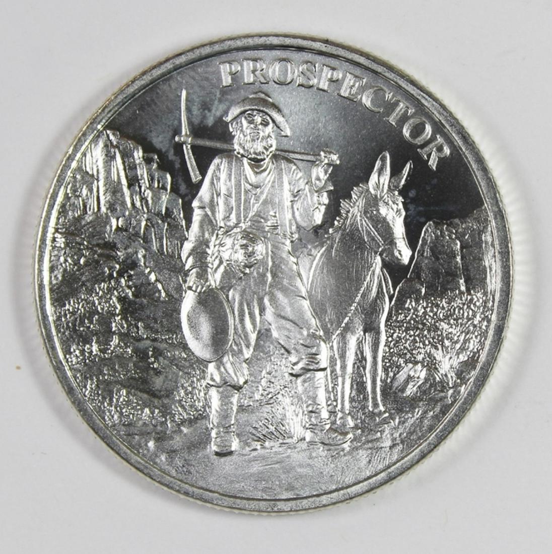 PROSEPECTOR 1 OZ SILVER ROUND: .999 PURE SILVER. ESTIMATE: $35-$50