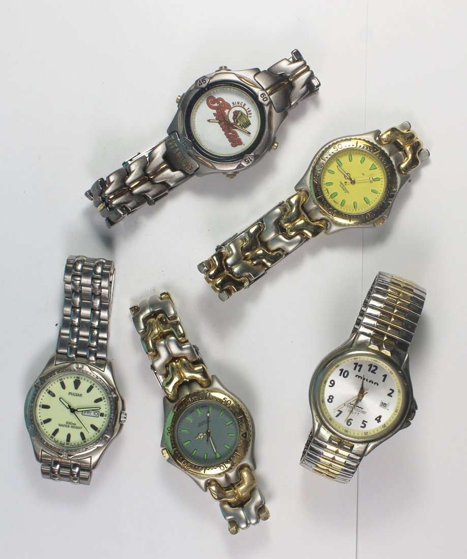 LOT OF FIVE WRISTWATCHES: ALL PREOWNED. ALL QUARTZ ONE OF THEM IS CLEVELAND INDIAN WATCH. SEE PHOTOS, ESTIMATE: $1-$100