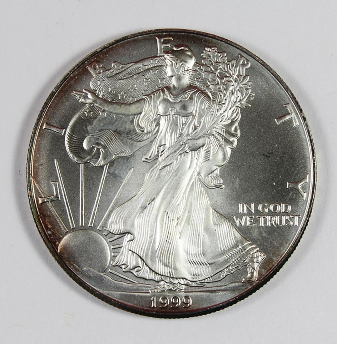 1999 AMERICAN SILVER EAGLE: SUPERB GEM BU! ESTIMATE: $75-$100
