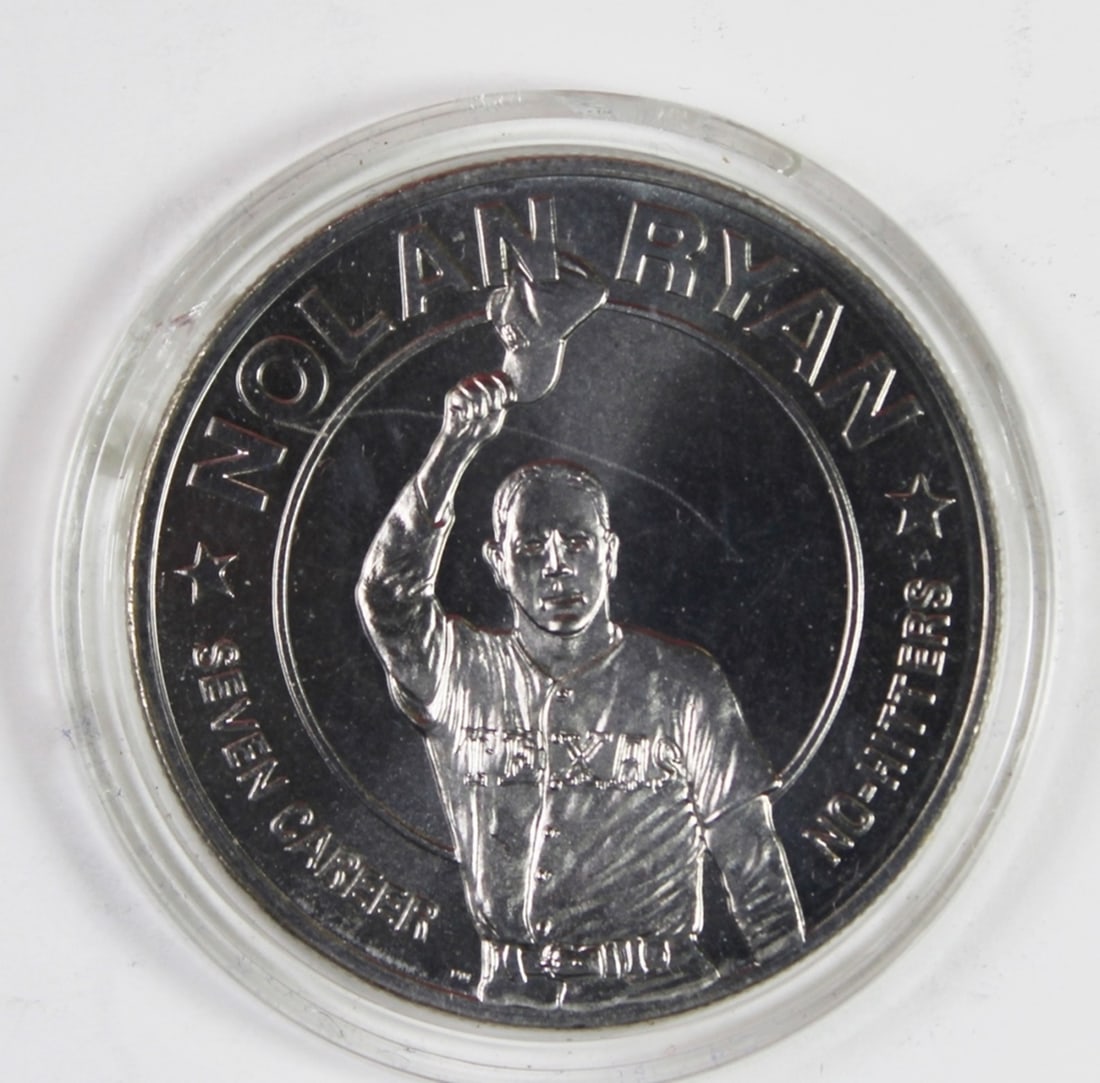 1993 LIBERIA $1 NOLAN RYAN: COMMEMORATIVE COIN. 7 NO-HITTERS. COMES WITH BOX. ESTIMATE: $30-$50