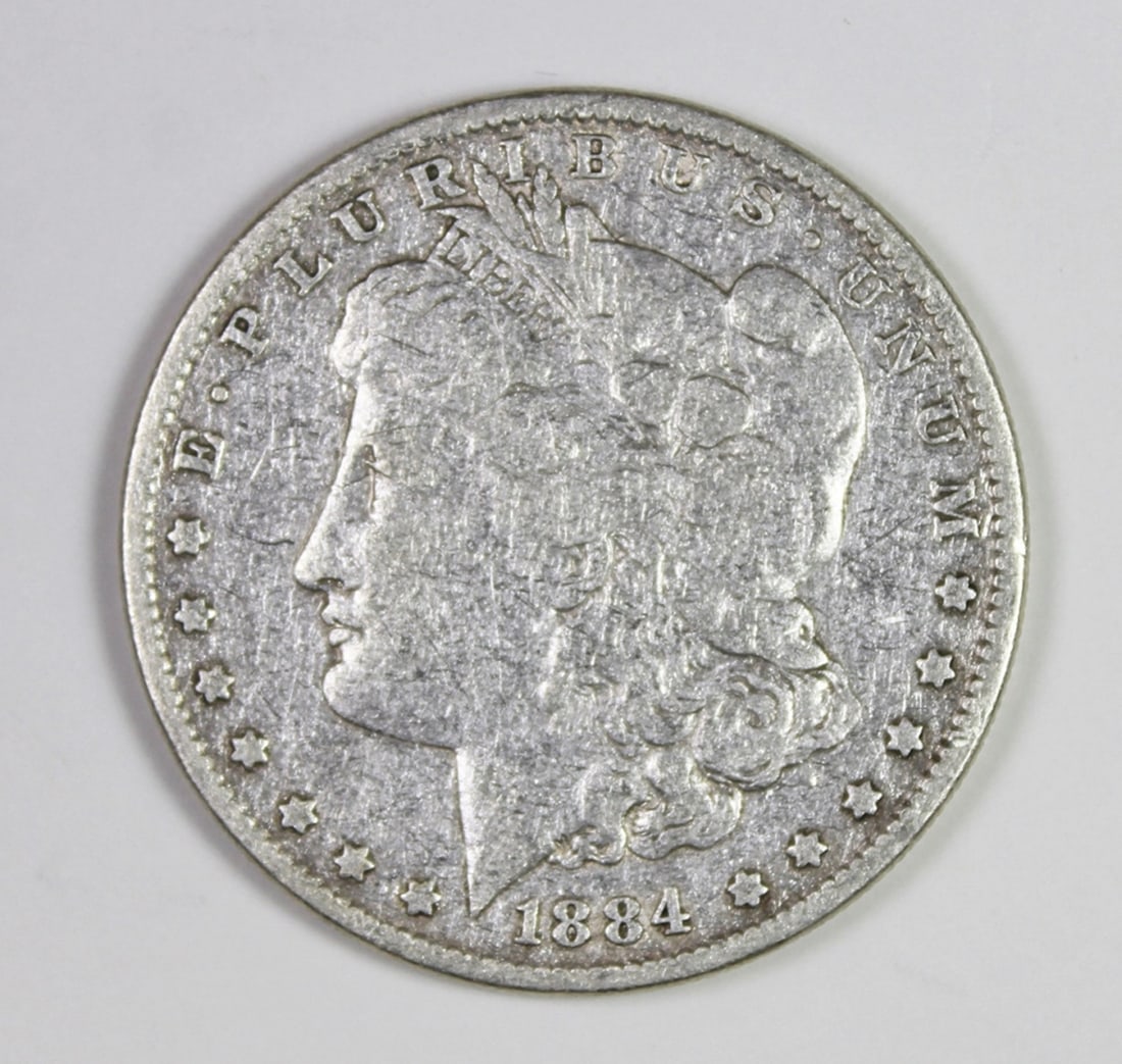 1884 MORGAN SILVER DOLLAR (1 of 2)
