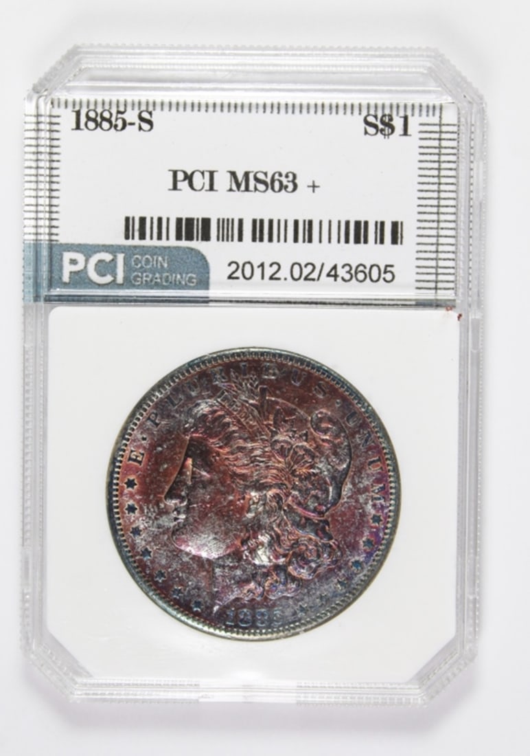 1885-S MORGAN SILVER DOLLAR: PCI MS 63+. CH BU. BEAUTIFUL COLOR ON OBVERSE. ESTIMATE: $450-$500