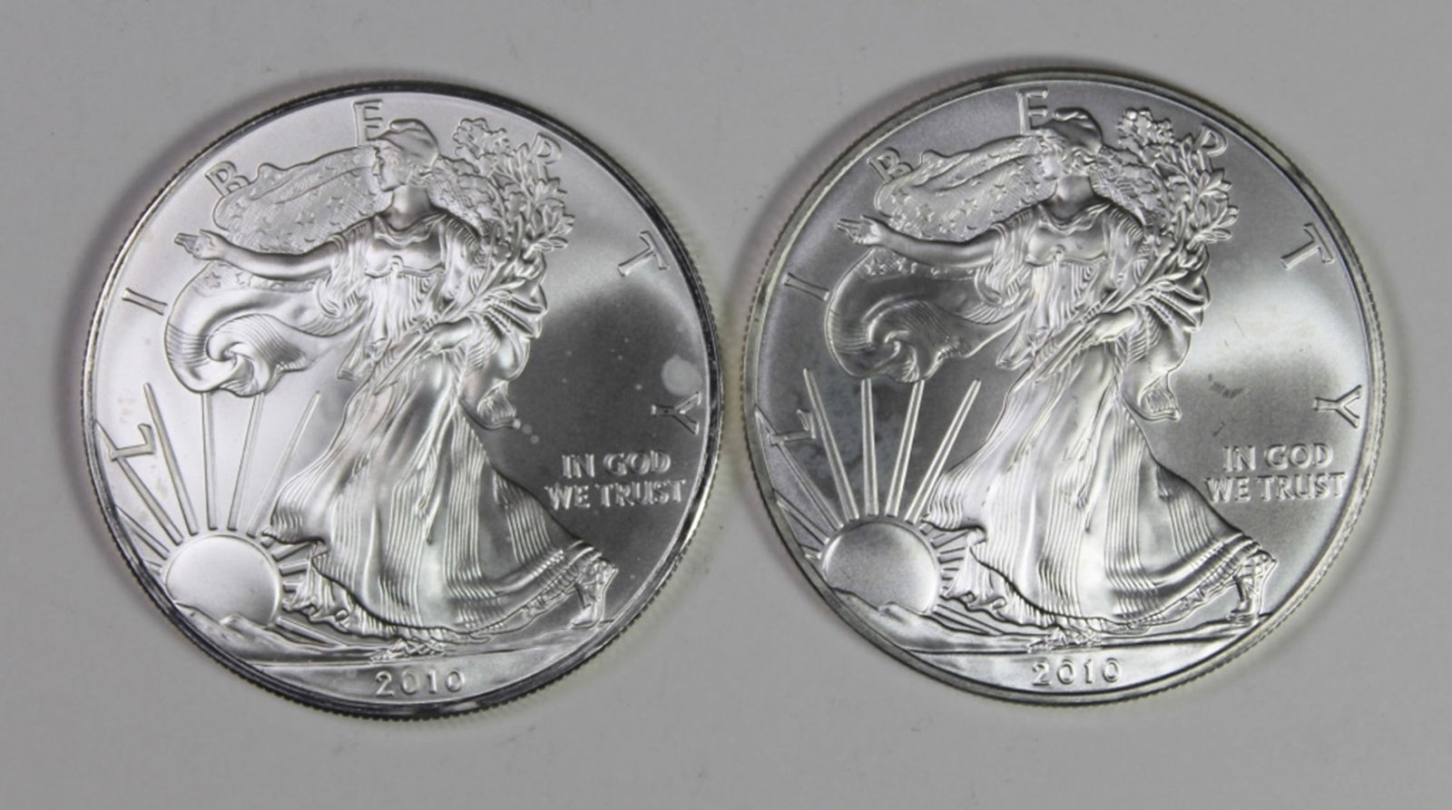(2) 2010 AMERICAN SILVER EAGLES (1 of 2)