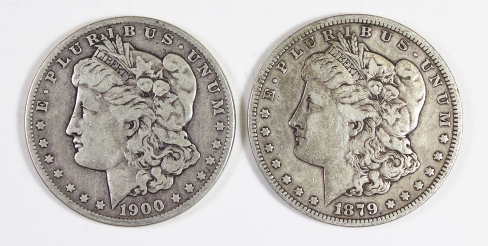 (2) MORGAN SILVER DOLLARS: VG/VF. 1900-O AND 1879. ESTIMATE: $100-$150