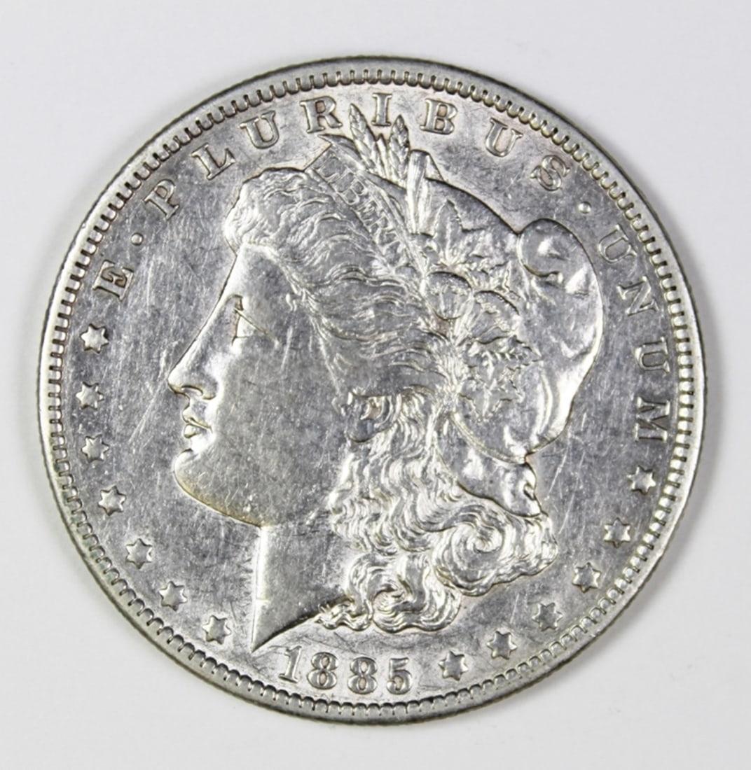1885-O MORGAN SILVER DOLLAR: AU/BU. BLAST WHITE! ESTIMATE: $75-$100