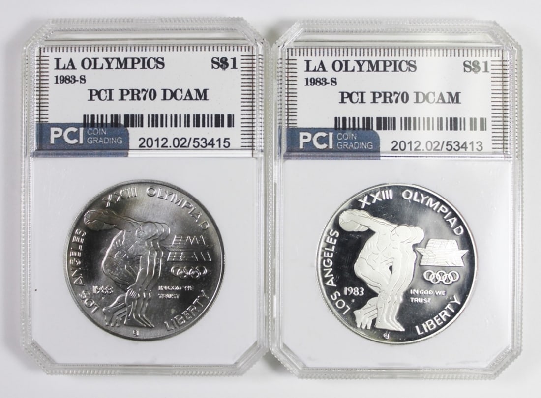 (2)1983-S COMMEMORATIVE SILVER DOLLAR: LA OLYMPICS. PCI PR 70 DCAM. ESTIMATE: $100-$150