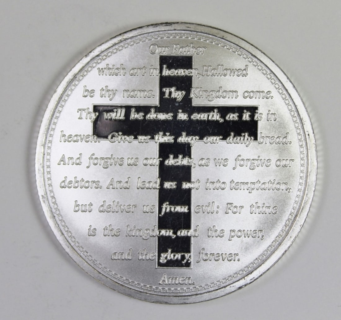 THE LORD'S PRAYER SILVER ROUND: .999 PURE SILVER. HAS THE LORD'S PRAYER SCRIPTED ON THE FRONT. GREAT GIFT ITEM! ESTIMATE: $50-$75