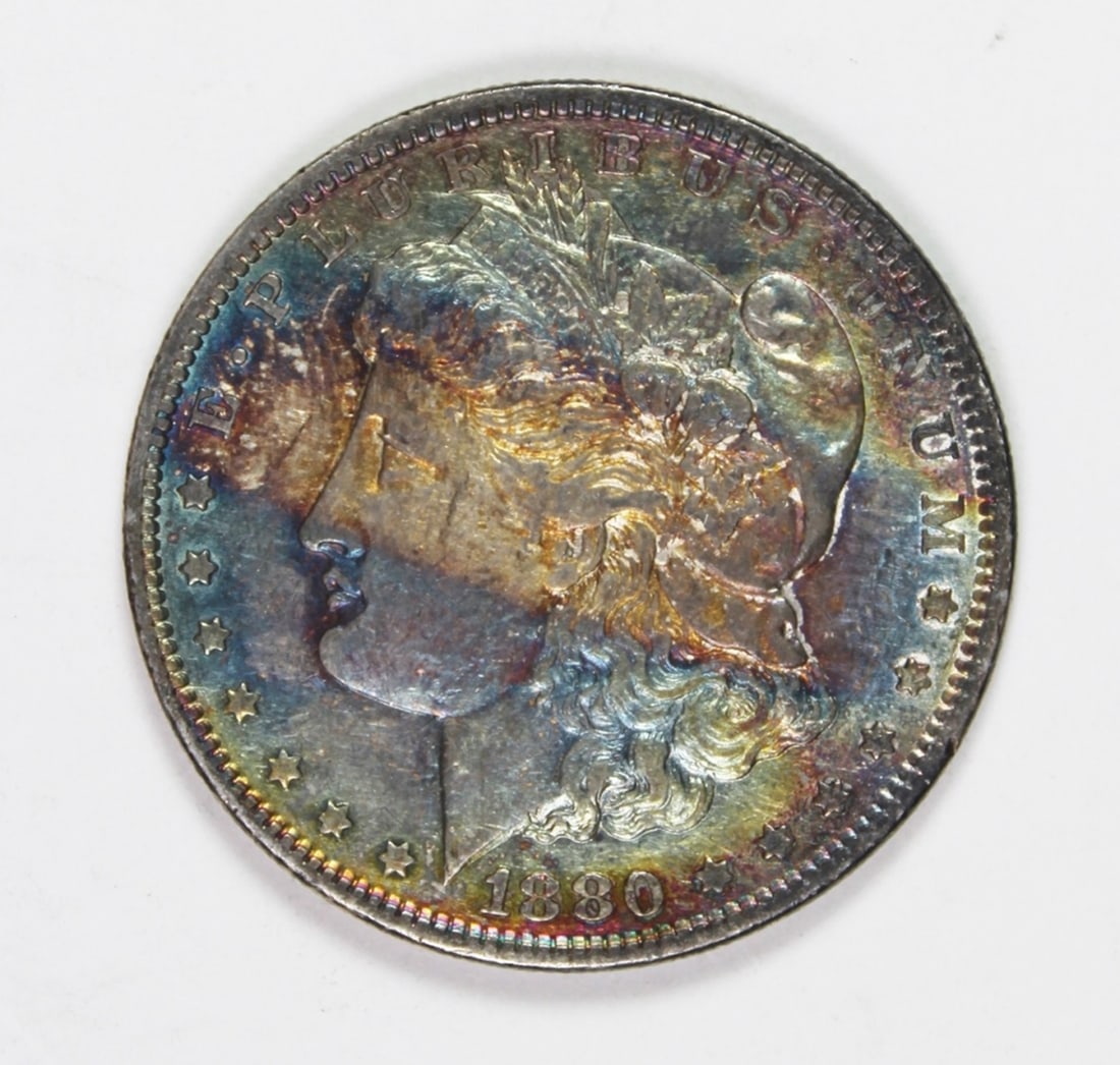 1880 MORGAN SILVER DOLLAR: AU/BU. BEAUITFUL RAINBOW COLOR! ESTIMATE: $75-$100