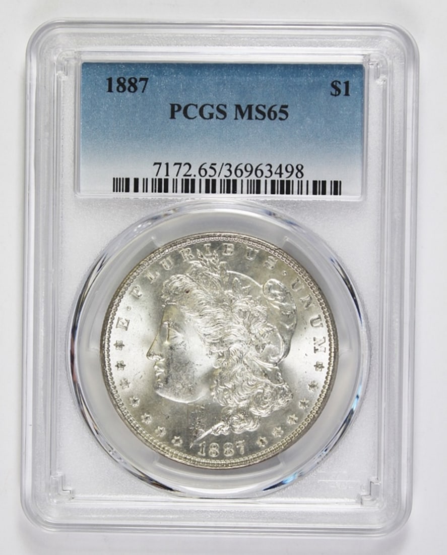 1887 MORGAN SILVER DOLLAR: PCGS MS 65. ESTIMATE: $200-$300
