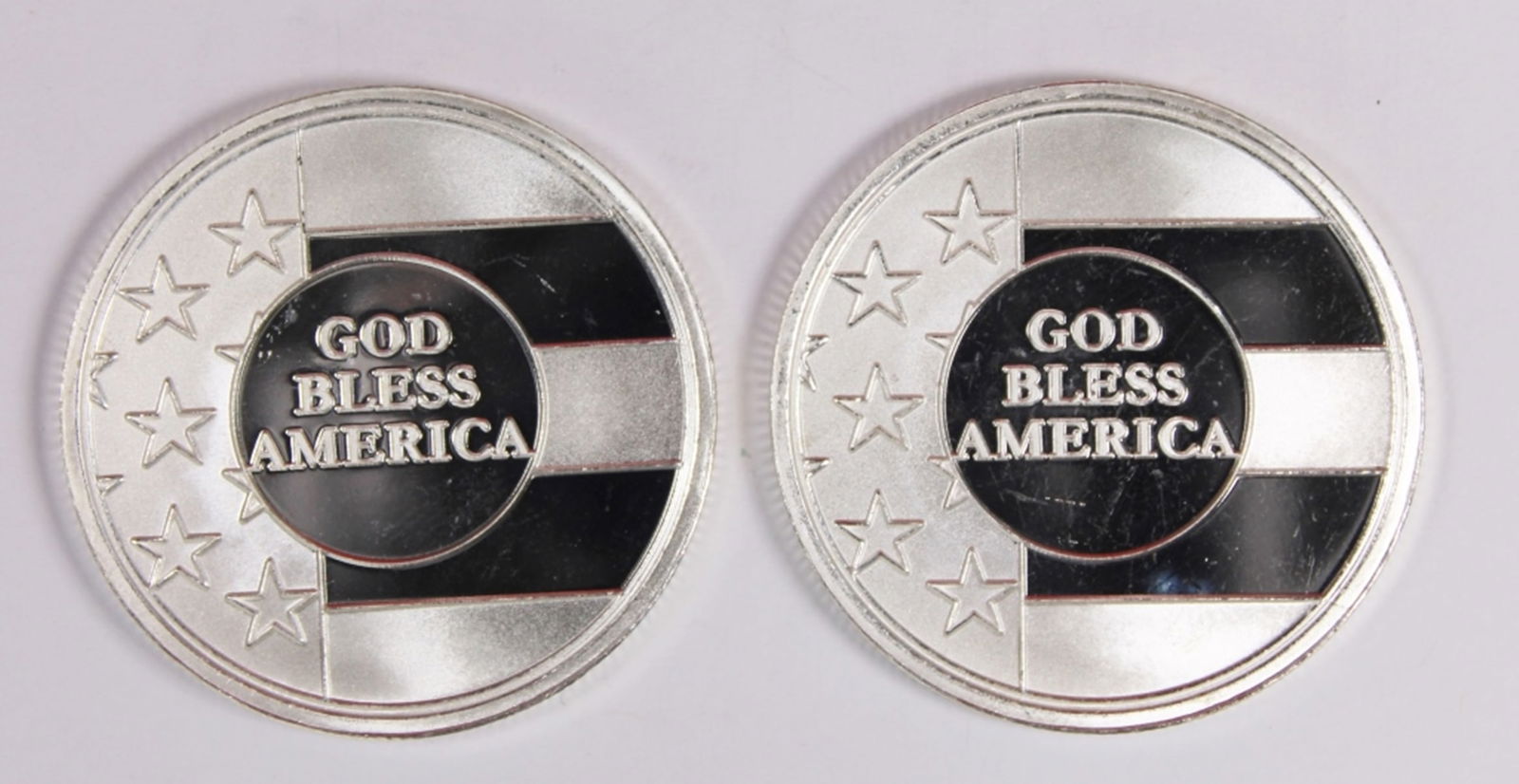(2) "GOD BLESS AMERICA" SILVER ROUNDS (1 of 2)