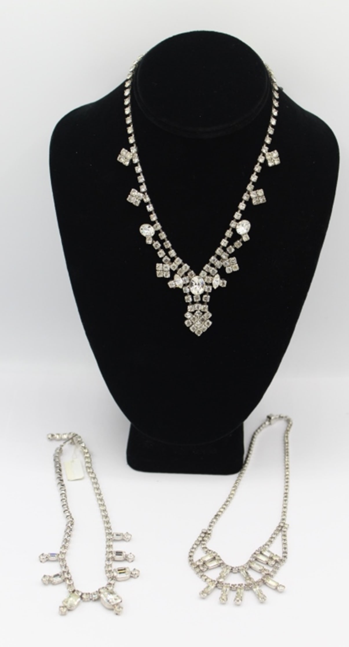 LOT OF RHINESTONE NECKLACES: NECKLACES TOTAL. SEE PHOTOS. ESTIMATE: $1-$100