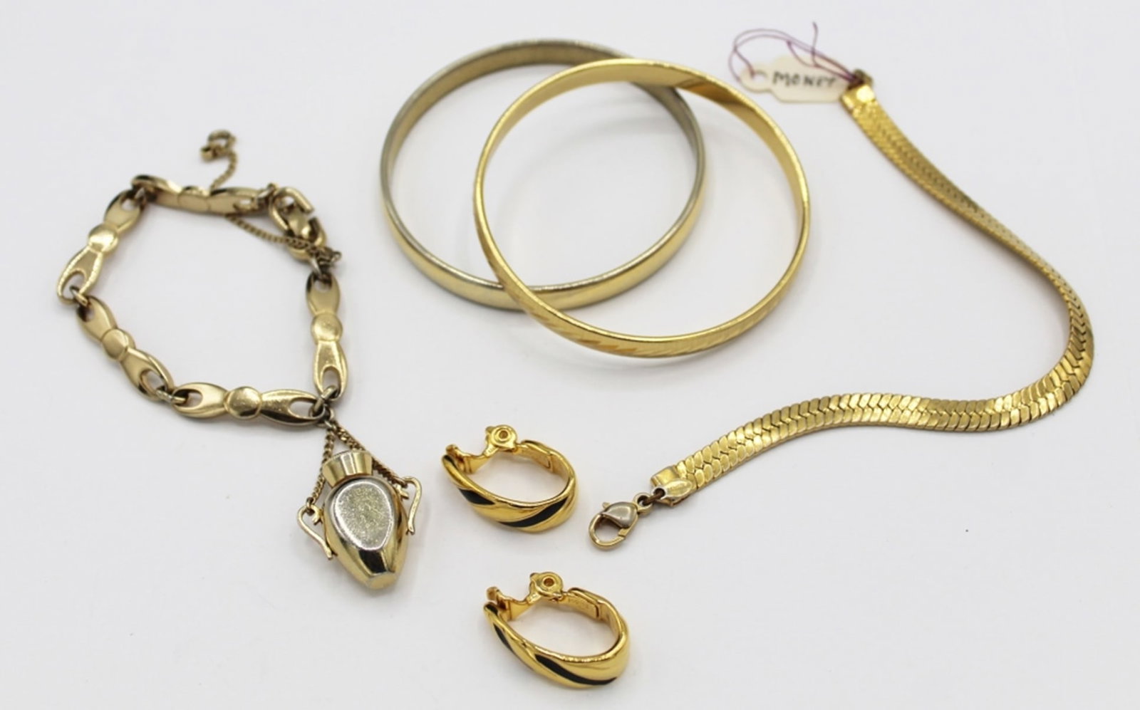 MONET JEWELRY LOT: 5 PIECES OF MONET STAMPED JEWELRY. SEE PHOTOS. ESTIMATE: $50-$100