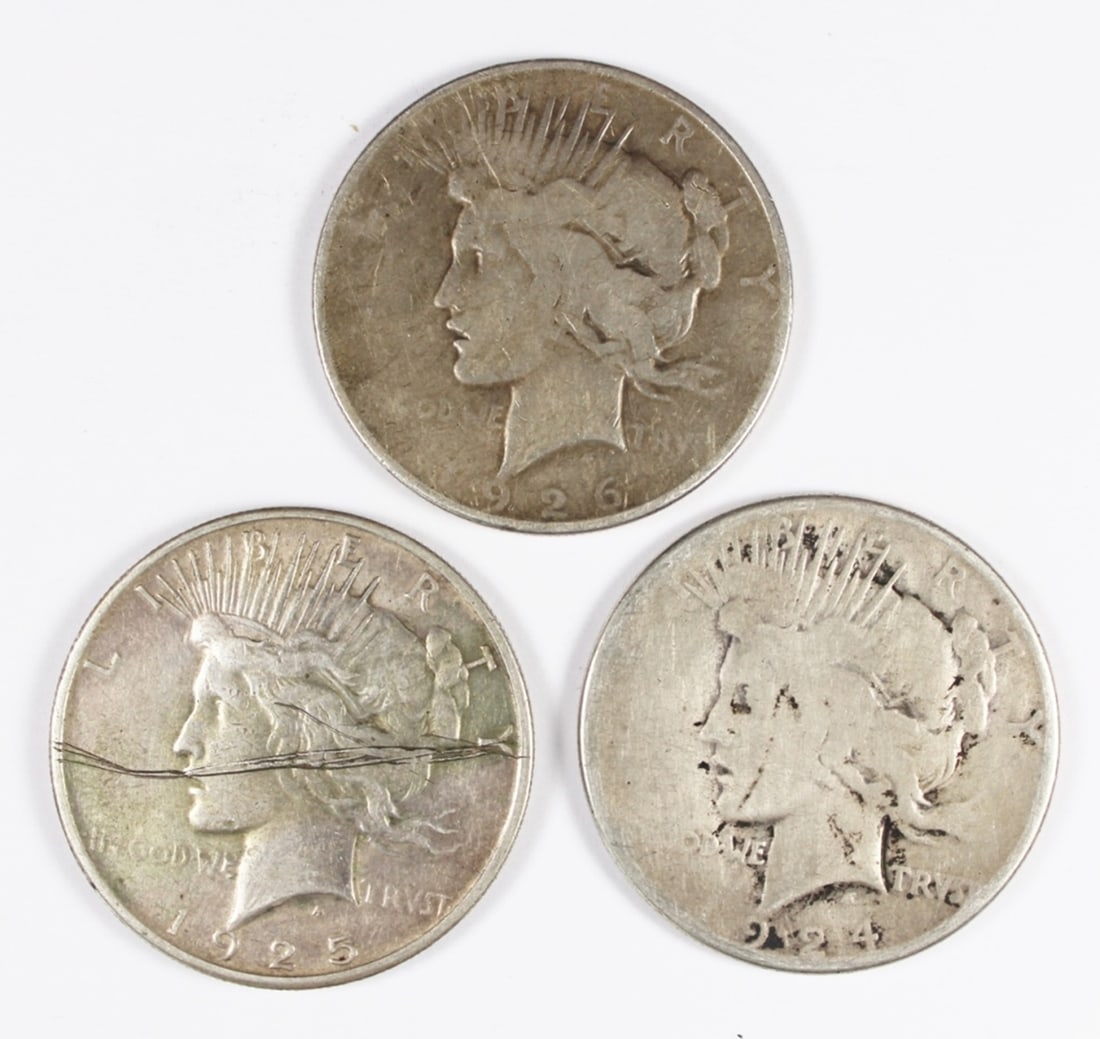 (3) PEACE SILVER DOLLARS: GOOD. 1924, 1925, 1926. SCRATCHED. ESTIMATE: $75-$100